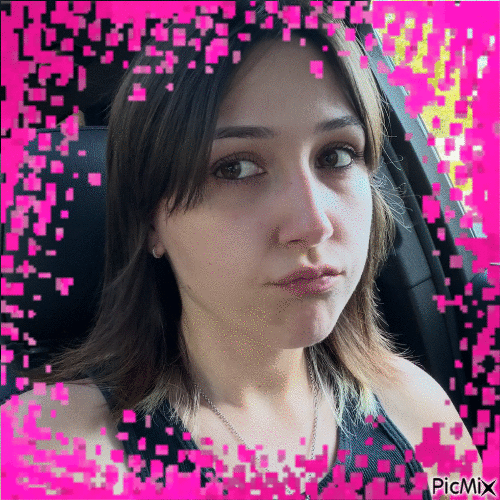 brittany, sitting in her car, mid-thought
